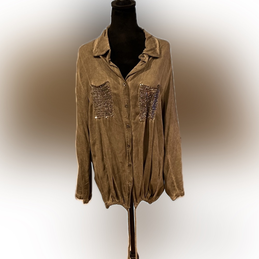 Shirt with sequened pockets and drawstring hem.